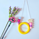 Naszyjnik silikonowy do gryzienia i terapii sensorycznej - słoneczny i beżowy motylek