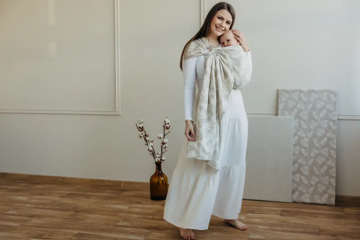 Ułożenie materiału chusty kółkowej na aluminiowych kółkach